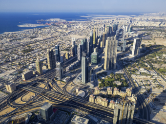 Aerial view of Dubai city from the top of a tower.