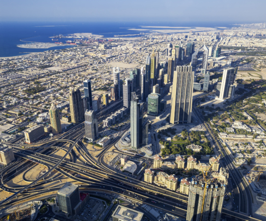 Aerial view of Dubai city from the top of a tower.
