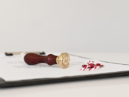 front-view-blurred-certificate-wax-seal