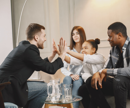 Young parents had troubles in their relationship. The daughter was depressed. Pshycoterapist solved the problem and clapping hands with the girl.